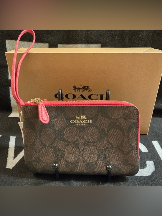 Coach Handbags - Coach Brown and Pink Wristlet nwt